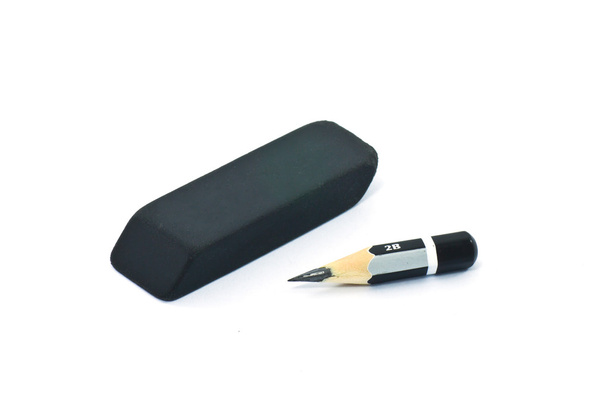Дуже короткий олівець і чорна гума
 - Фото, зображення