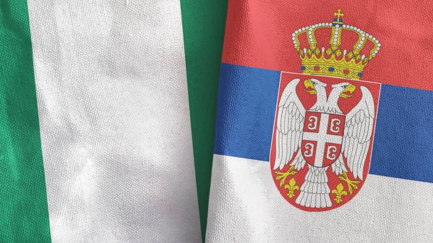 Sérvia e Nigéria duas bandeiras de pano têxtil 3D renderização - Foto, Imagem