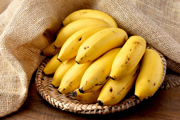 bunch bananas on a wooden table - Photo, Image