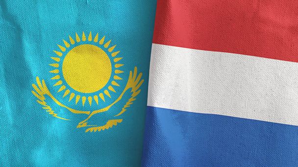 Нидерланды и Казахстан два флага текстильной ткани 3D рендеринг - Фото, изображение