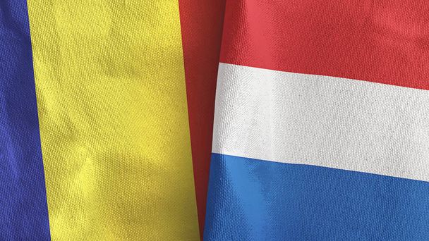 Nizozemsko a Rumunsko dvě vlajky textilní tkaniny 3D rendering - Fotografie, Obrázek