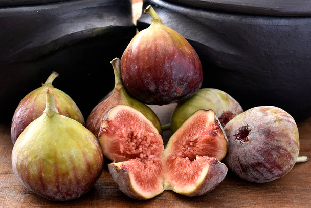 fresh ripe figs on a wooden table - Photo, Image