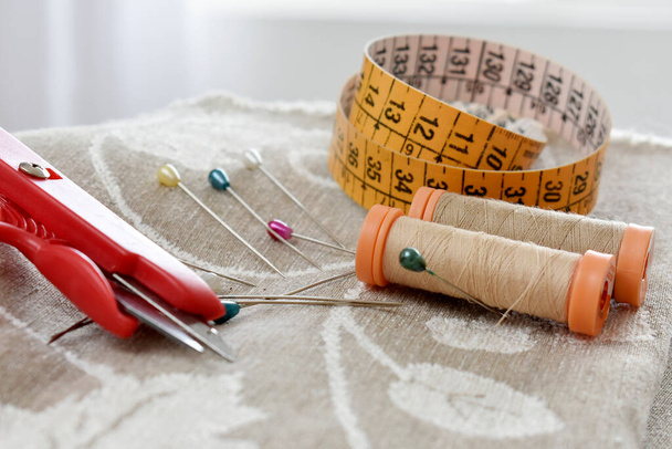 sewing accessories on wooden background - Photo, Image
