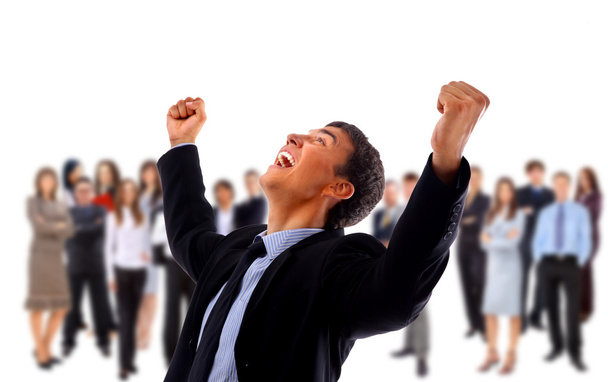One very happy energetic businessman with his arms raised - 写真・画像