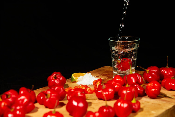 Mexican traditional alcohol drink, chili and lime. - Photo, Image