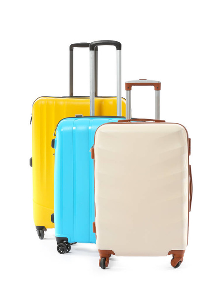 Packed suitcases on white background - Φωτογραφία, εικόνα
