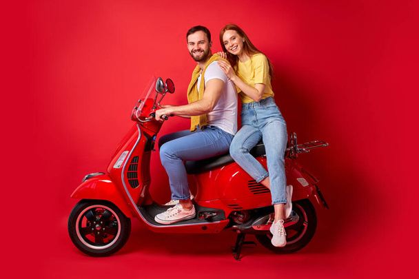 caucasian good-looking couple riding moped spending weekend journey - Valokuva, kuva