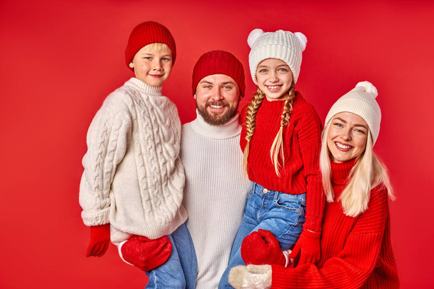 portrait of cheerful family with kids posing isolated in studio - Photo, Image