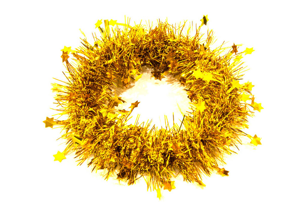 Christmas Golden garland in the form of a wreath and a circle on a white background. Christmas decoration - Fotó, kép
