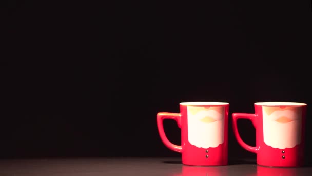 新年とクリスマスにお祝いの背景。紅茶の蒸しマグカップ. - 映像、動画