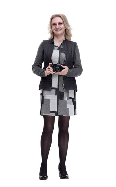 attractive young woman with a photo camera . isolated on a white - Foto, afbeelding