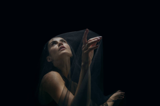 Graceful classic female ballet dancer isolated on black studio background. The grace, artist, movement, action and motion concept. - Fotó, kép