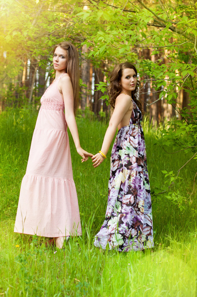 Young girls in the forest - Foto, Imagen