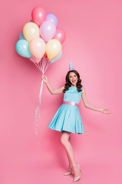 Full body vertical photo of tender lady event party hold air balloons celebrate birthday arrange surprise for friend wear blue teal mini dress skirt high-heels isolated pink color background - Foto, imagen