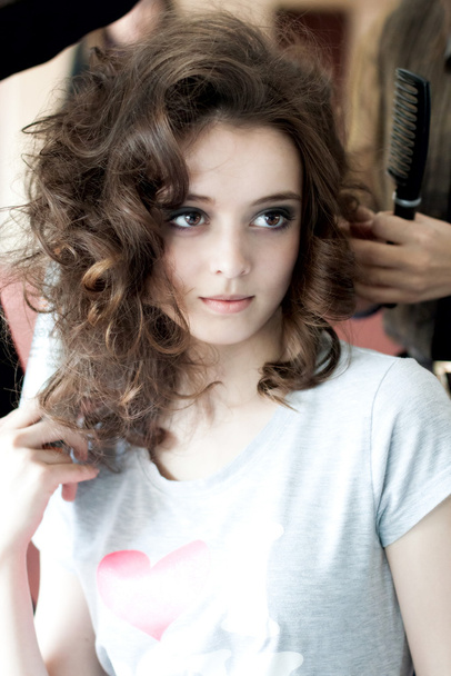 Model with gets a hairstyle - Fotó, kép