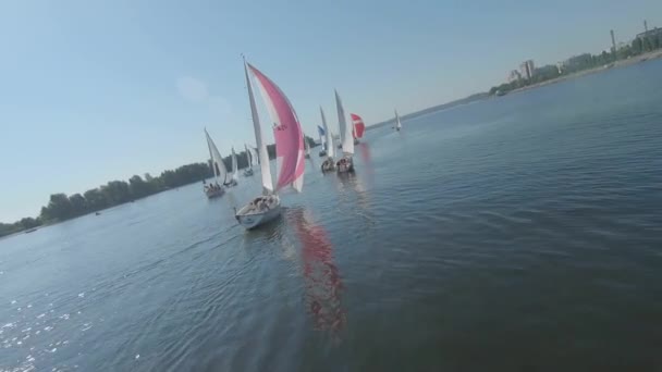 FPV drone view footage of regatta or sailing race at Dnipro river - Záběry, video
