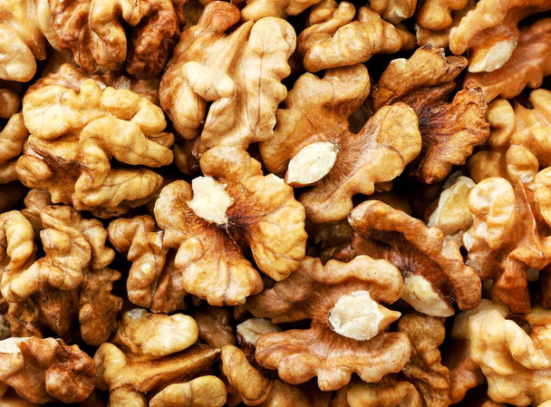 Walnut kernels close-up, background. View of the top. - Photo, Image