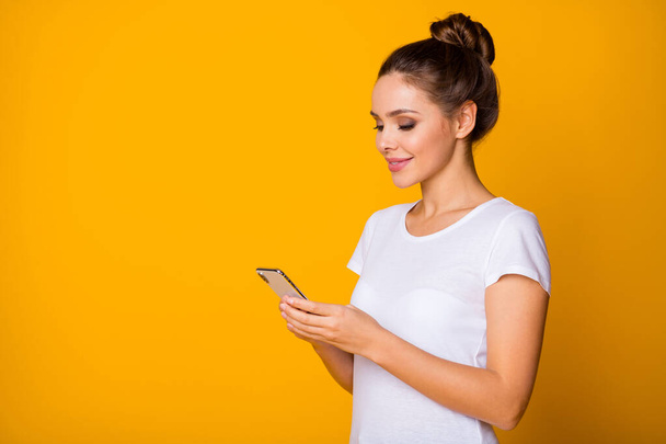 Portrait positive cheerful girl use cellphone read social media novelty enjoy online friend communication conversation wear style stylish trendy outfit isolated bright shine color background - Φωτογραφία, εικόνα