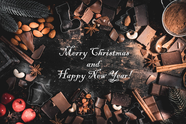 Merry Christmas and Happy New Year greeting post card wallpaper with text in frame festive ingredients of baking cookies - Foto, Imagem