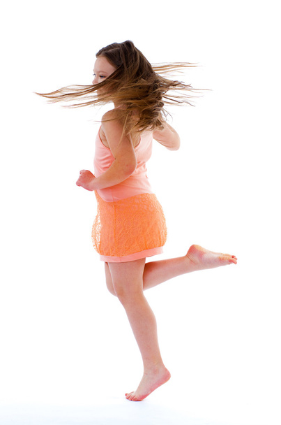 Young girl jumping on vacation. - Valokuva, kuva