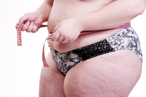 Detail of the trunk of a girl with obesity and cellulite when me - Foto, imagen