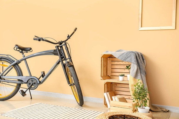 Interior of modern room with bicycle and wooden box - Photo, Image