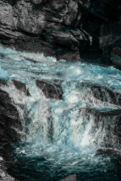 Wild and fast moving river rapids white water rushing over rugged cliffs. Close up. . High quality photo - Fotó, kép
