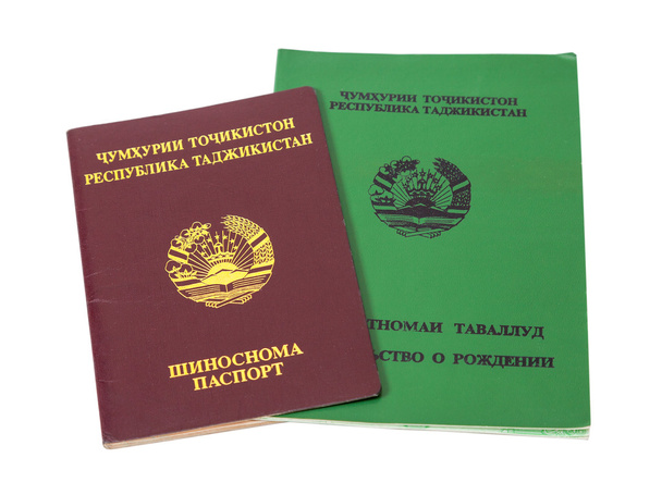 Tadżykistan paszport i akt urodzenia na białym tle  - Zdjęcie, obraz