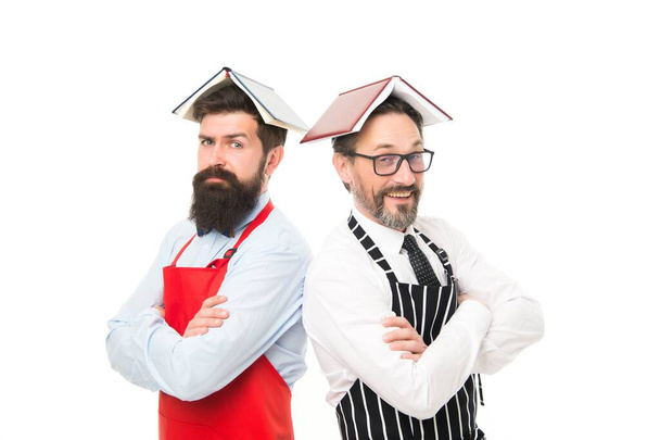 I love my job. housewife men cooking. Culinary ingredient. menu planning. happy chef team in apron. bearded men with recipe book. cafe and restaurant opening. catering business. seating plan - Photo, Image