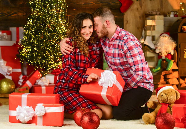Family time. Happiness and joy. Best holiday. Christmas time. Celebrate new year at home. Spread love. Happy woman and man. Holiday gift. Holiday mood. Couple in love making surprise for each other - Photo, Image