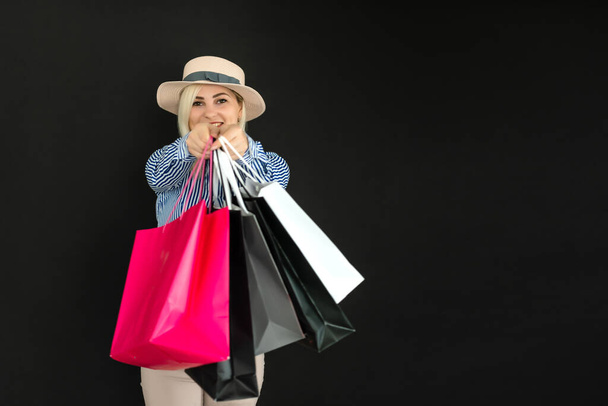 woman with shopping bags on black friday - Photo, Image