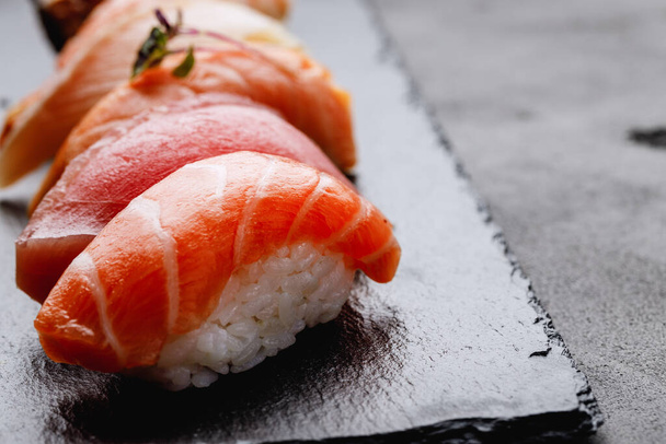 Clsoe up of nigiri sushi on plate - Фото, изображение