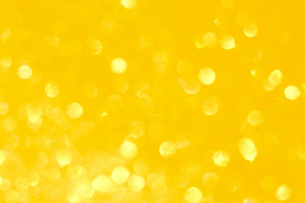 Amarillo desenfocado bokeh brillo luces fondo soleado verano vibraciones tonificado - Foto, imagen