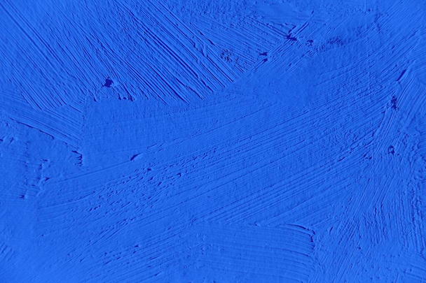 Painting close up of vivid blue color, paint brush strokes texture for interesting, creative, imaginative backgrounds. For web and design. - Photo, Image