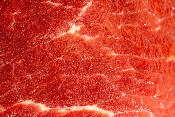 Fresh raw red meat texture closeup, marbled meat - Foto, afbeelding