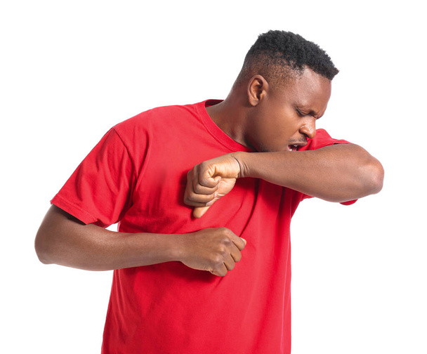Coughing African-American man on white background - Фото, изображение