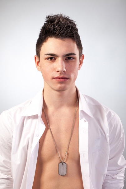 Healthy muscular young man on grey background - Φωτογραφία, εικόνα