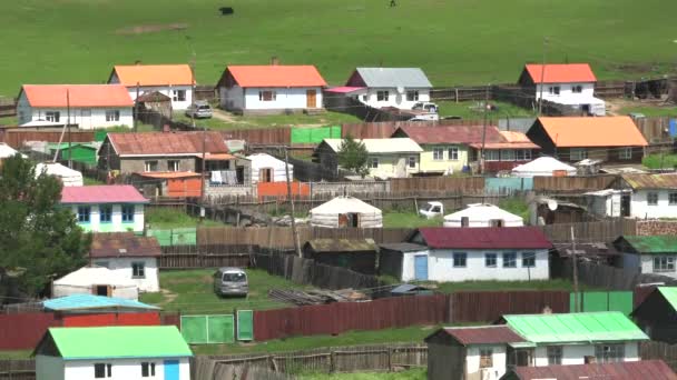 Colorful roofed houses in classic city in Central Asia.Traditional Siberian city.Garden geography ger gers Russia groovy house houses town Mongolia settlement traditional cinematic cities house yurt yurts cramped crowded peaceful urban Tsetserleg 4K - Footage, Video