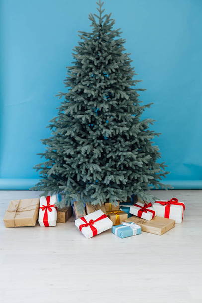 Christmas tree with gifts New Year scenery room winter - Photo, Image