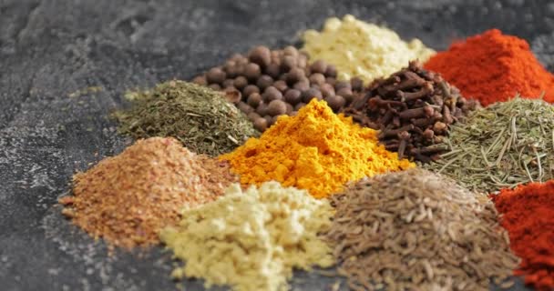 Different spices on dark background - Footage, Video