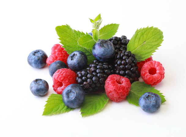 Delicious ripe berries on white background - Foto, afbeelding