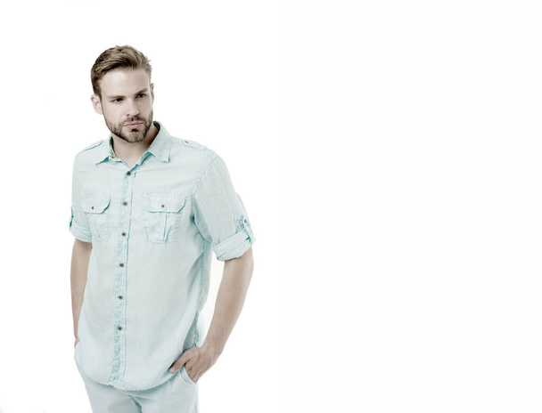 A pinch of genuine style. Caucasian guy wearing casual summer style isolated on white. Handsome man with unshaven face and crop cut hair style. His haircut and style make him really attractive - Foto, afbeelding