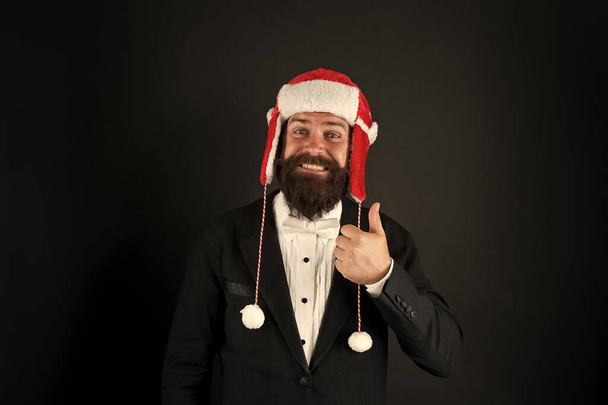 Business santa wish you financial growth. Business corporate. Man with beard in smart suit and Santa hat. Businessman Santa in jacket. Christmas party concept. Feeling warmth. Funny winter hat - Photo, Image