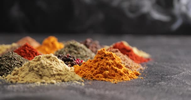 Different spices on dark background - Footage, Video