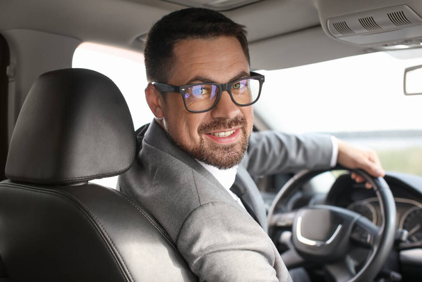 Successful businessman driving modern car - Fotografie, Obrázek