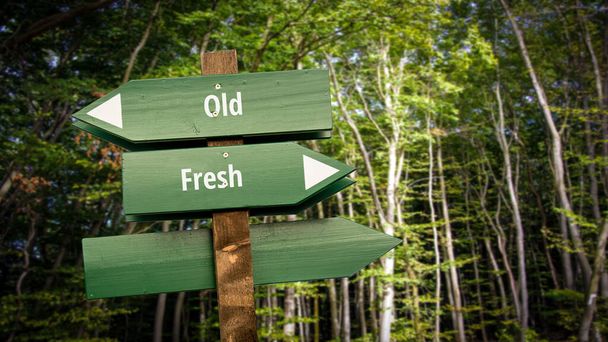 Street Sign the Direction Way to Fresh vs. old
 - Фото, изображение