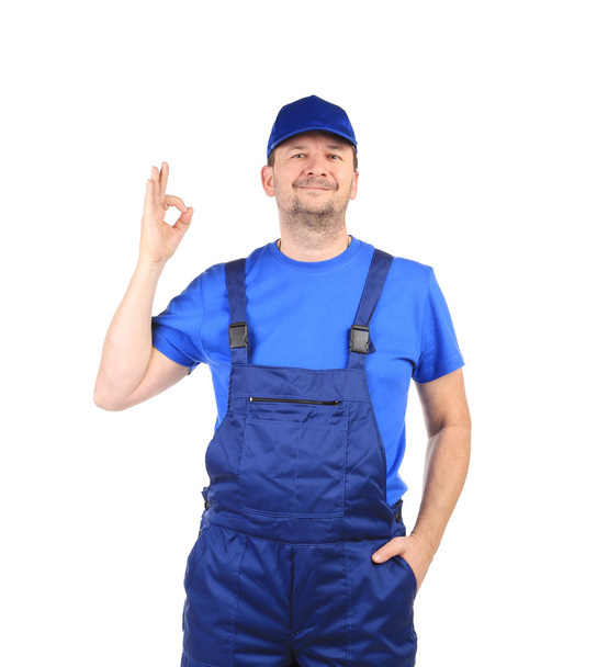 Man in blue overalls - Foto, immagini