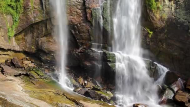 Majestic waterfall in Nuwara Eliya mountains, Sri Lanka with camera movement from bottom to top - Footage, Video