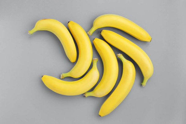 Group of bananas on blue background. - Foto, Imagem