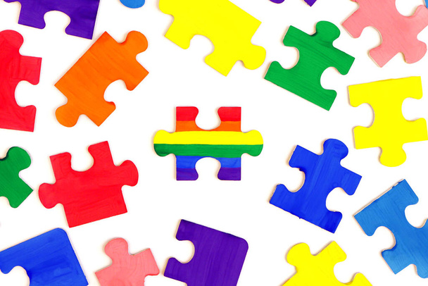 LGBT concept. Rainbow colored puzzle isolated on white background. Gay Pride. Concept of equality, acceptance of sexual minorities lesbian, gay, bisexual, transgender - Foto, afbeelding